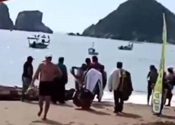 Tiburón le arranca una pierna a turista en playa de Melaque, Jalisco