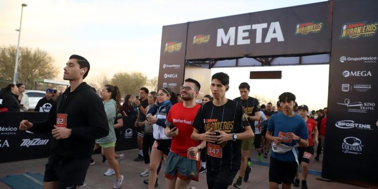 Angelica Martínez y Pedro Alejandro Rodríguez ganadores de la 6ta edición de la Carrera Naranjeros.